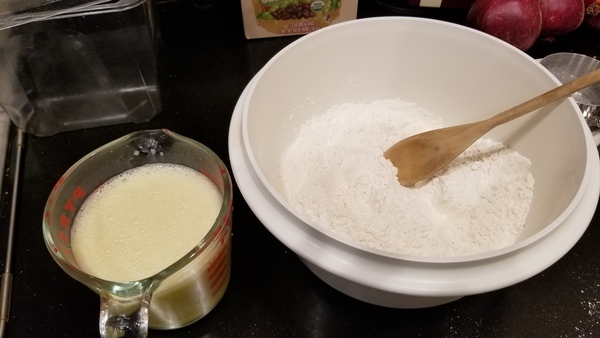 Dry mixture in bowl. Yolk/milk mixture in measuring cup