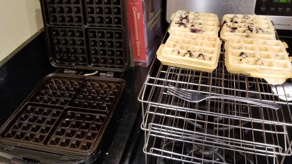 Waffles on rack. Waffle iron.